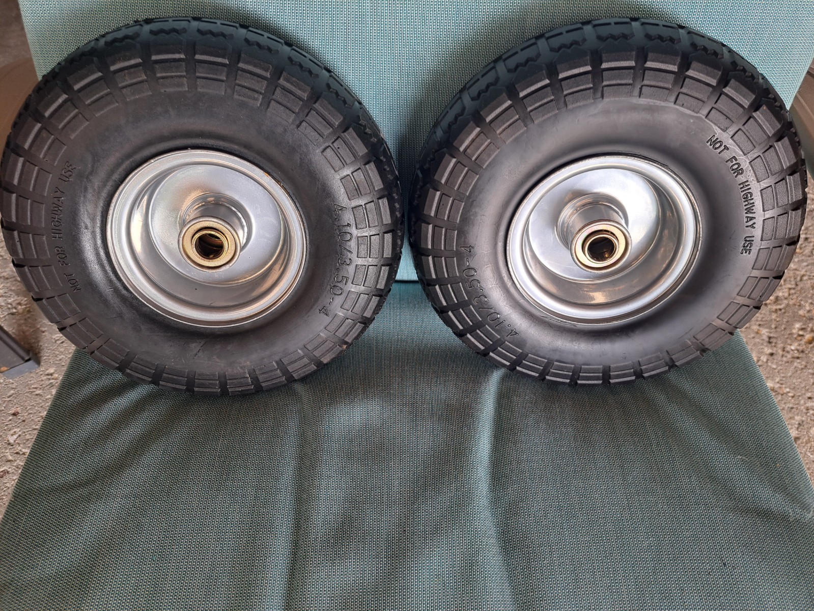 2 PCS 4.10/3.50-4 NO FLAT 10″ SOLID RUBBER TIRES WITH RIMS AND 5/8 BEARINGS